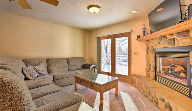Cozy Riverfront Home w/Fire Pit in Houghton Lake!