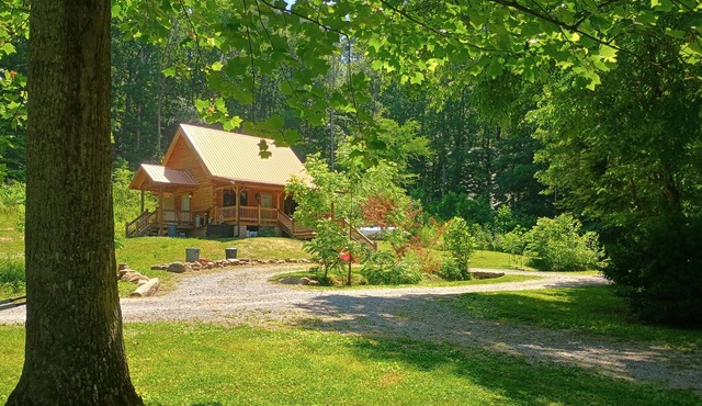 Cozy, secluded Dunlap cabin with a creek and playset by hangglider landing zone