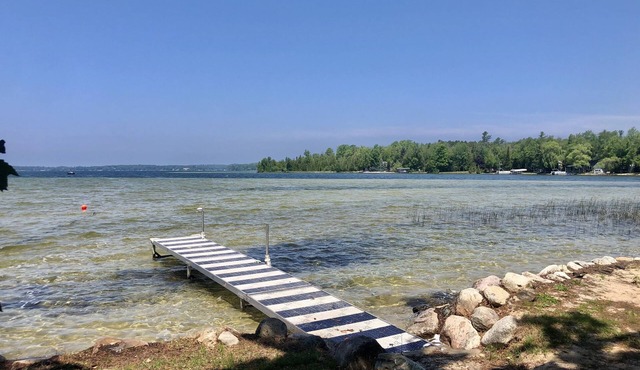 Cozy waterfront sunset cottage on Lake Leelanau. Air, Near Leland.