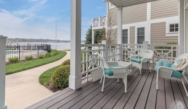 Discover comfort in Saugatuck at Lake Street Townhome #7, a 3BR retreat with pool views.