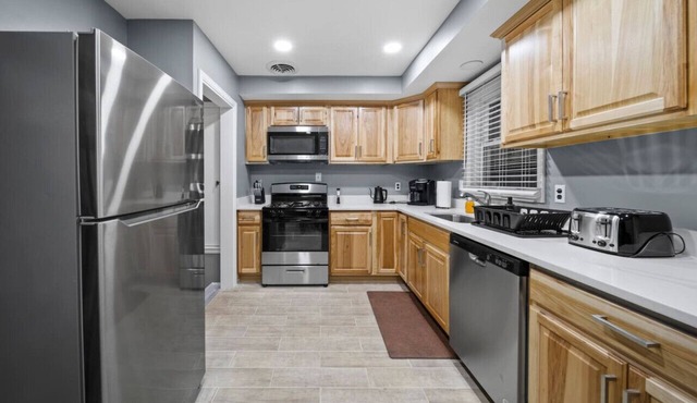 Elegant Oasis: 4-Bedroom Home Away from Home