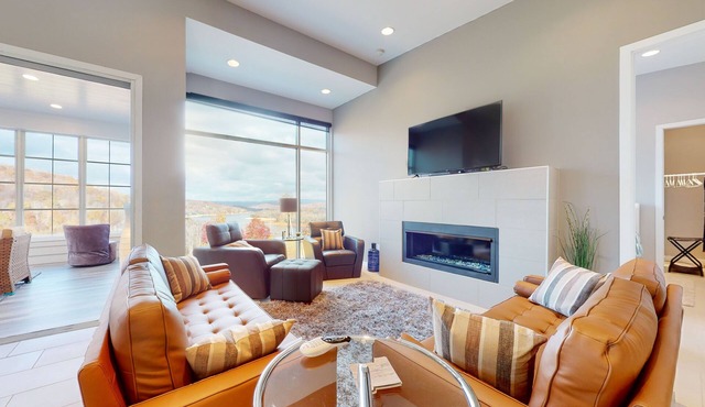 Elevated lake-view escape w/free attraction tickets, movie room, & sun room