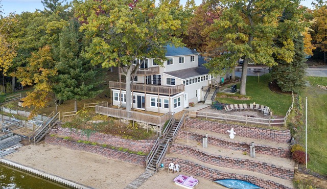 Huge lake house. 3 levels. 9 bedrooms. Great for groups. Large beach. Fire pit.