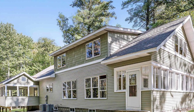 Impressive Dual Woods and Lake Homes That Sleep 32