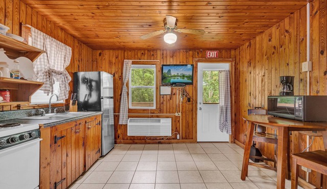 Lake Front Cabin With a Pool and Bar & Grill