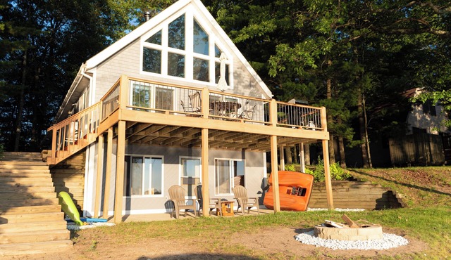 Lake House with Private Beach Where Sunsets Mesmerize <>