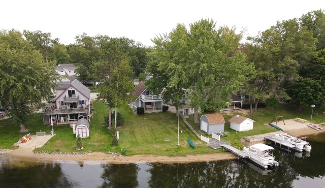 Loon Lookout has its own beach and is on a private lake in West Branch, MI