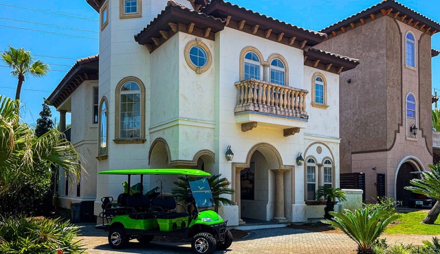 Mediterranean-style home with pool & hot tub access, W/D, AC & golf cart