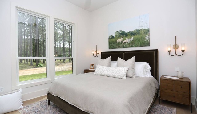 Modern 2 bedroom cottage on 250 private acres with wood-fire hot tubs.