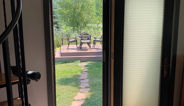 Our Thunder Moon Farm Stay- sleeps 7, framed by wildflowers. 4 miles to GB.