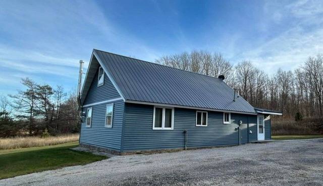Peaceful Rexton retreat on 20 acres, right next to snowmobile and ORV trails!