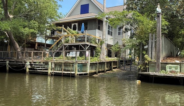 Private boat launch, dock, fully fenced yard for your dogs.