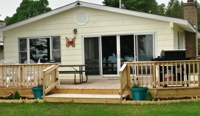 Remodeled, waterfront home on Portage Lake with dock & firepit - 2 dogs OK