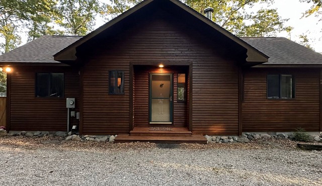 Riverside Cabin Near Torch Lake – Kayaks Included!