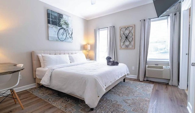 Sleep well in a quiet Cottage Hill retreat just a six-block walk from downtown, with a king bed, dedicated parking, and a stay guests return to again and again.