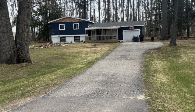 Spacious 4-Bedroom 2 bath home near Otsego Lake in quiet neighborhood.