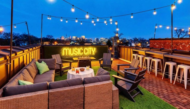Summer rooftops, skyline views, karaoke garage near Broadway