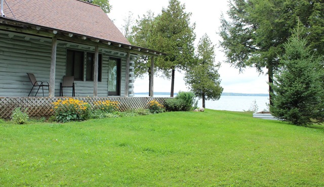 UP LIVING on Big Manistique Lake at its finest. 200 ft of private lake frontage.