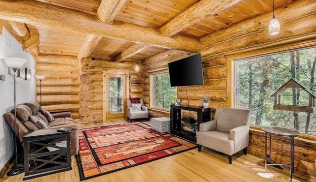 Waterfront home on Betsie River with hot tub & sauna near skiing at Crystal Mtn