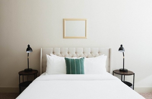 Montgomery Apartment | Walk to the Renaissance, Convention Center, dining, and nightlife from this spacious downtown retreat with a king bed, private balcony, full kitchen, Smart TV, and free parking for easy stays. today!