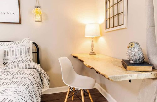 Montgomery Apartment | Trade hotel hallways for quiet streets, historic charm, and evenings that finally slow down.