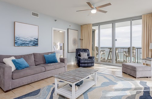 Pensacola Beach Condo | Spacious, open layout floor to ceiling with a wrap around balcony - ED1250