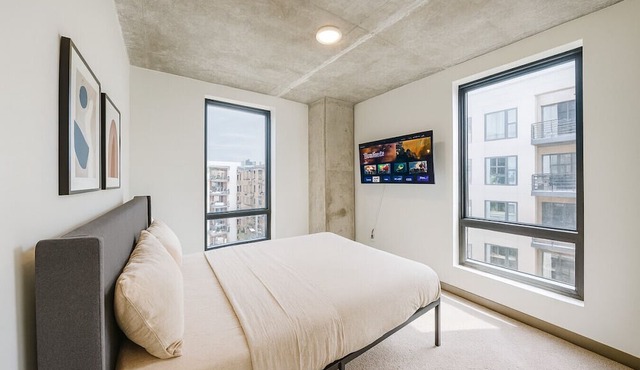 Bright 2BR Apt | Pool, Gym & Walkable Area
